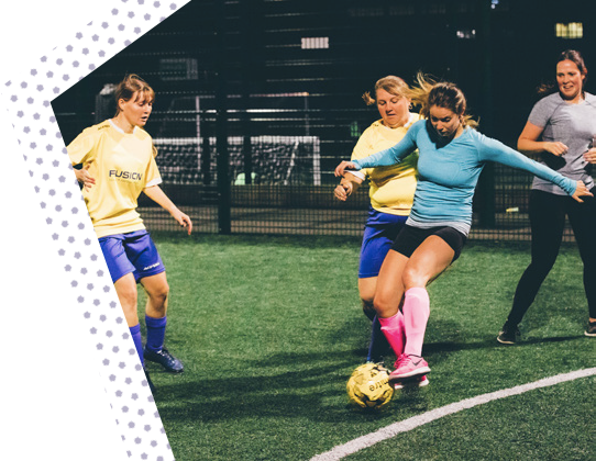 Girls playing football